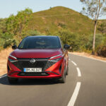 NL-PB-10-New-refreshed-Qashqai-2024-in-fuji-sunset-color-driving-on-the-road-in-Faro-Portugal